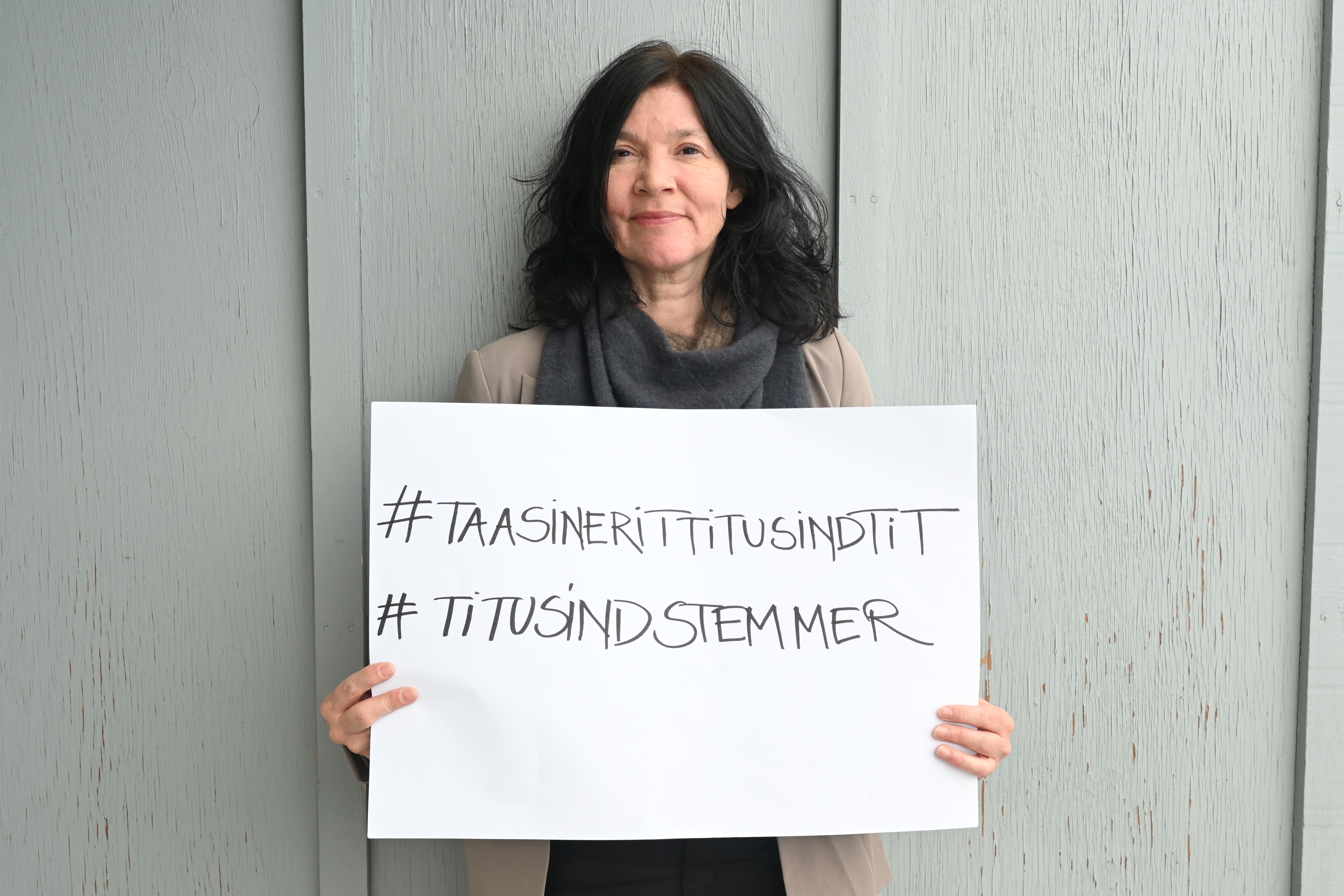 Tilioqs handicaptalsmand Anja med et #titusindstemmer skilt